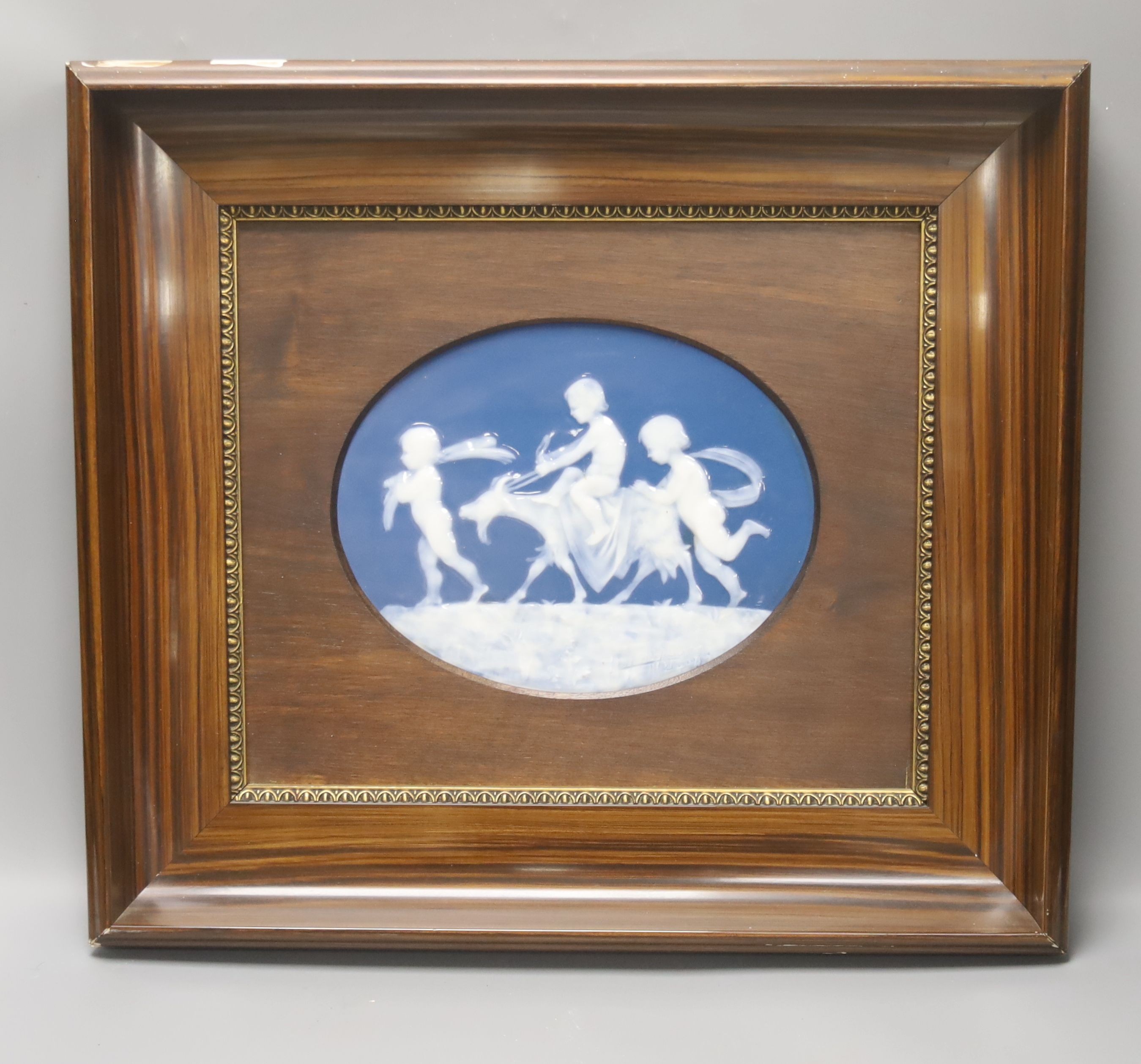 An early 20th century Limoges pate sur pate oval plaque, 18.5x 23.5cm, framed Frame external - 43x49cm